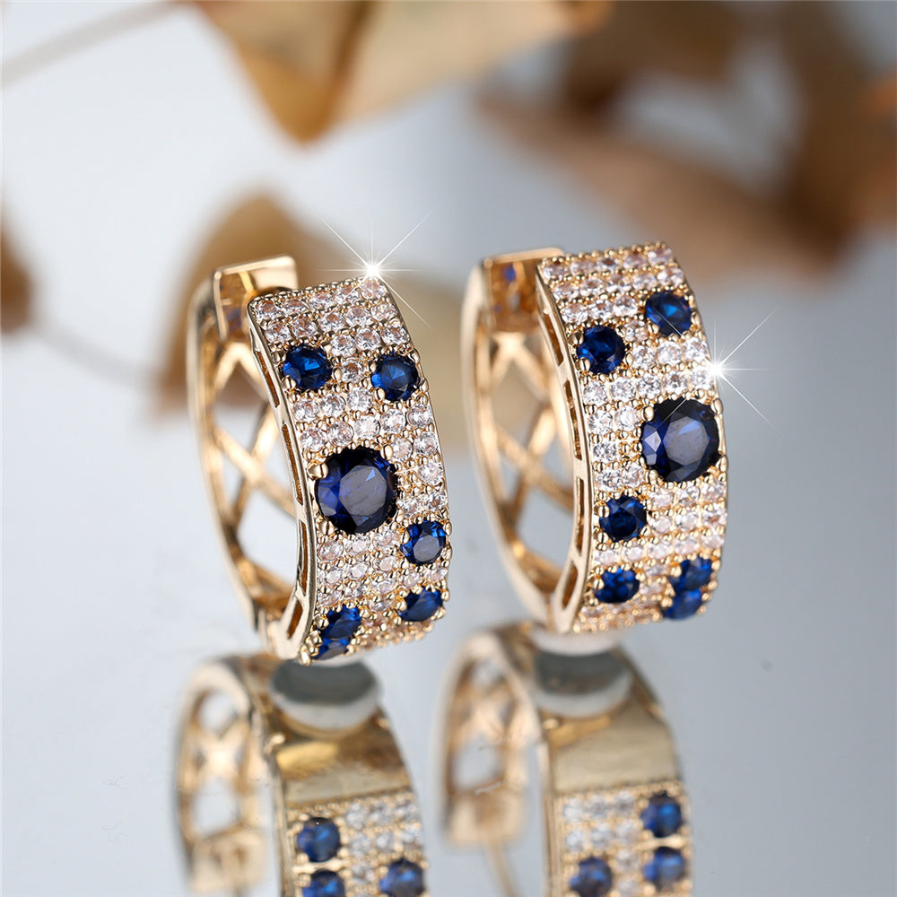 Blue Sapphire and Cubic Zirconia Huggie Earrings - Truly Yours