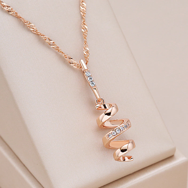 Kinel 585 Rose Gold Tone Spiral Pendant Necklace – Natural Zircon Accents