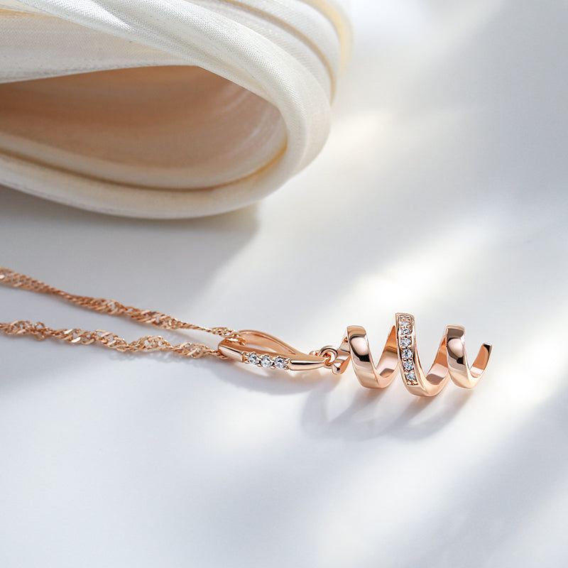 Kinel 585 Rose Gold Tone Spiral Pendant Necklace – Natural Zircon Accents - Truly Yours