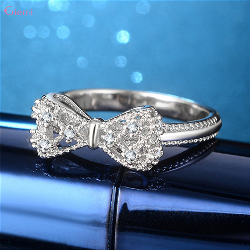 Elegant Sterling Silver Sparkling Bowknot Ring – Platinum Finished