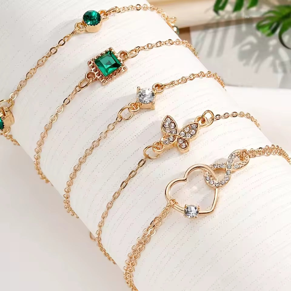 5-Piece Vintage Gold Bracelet Set: Infinity, Hearts, & Emerald Accents