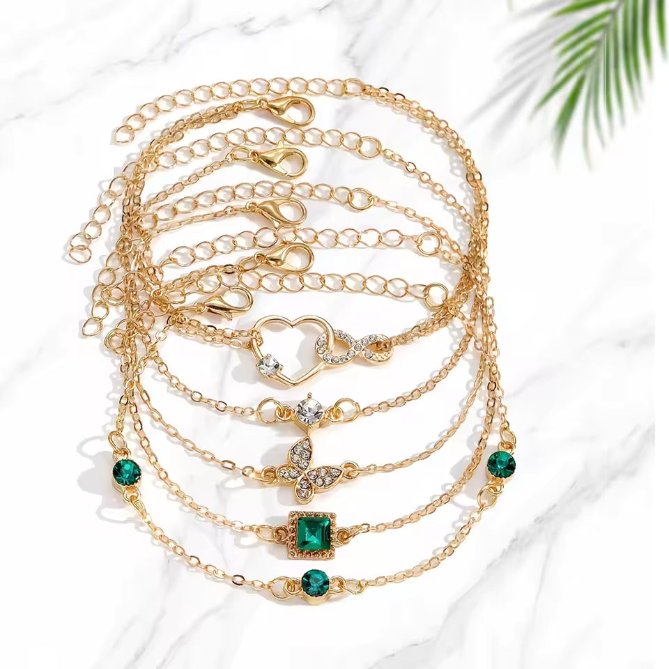 5-Piece Vintage Gold Bracelet Set: Infinity, Hearts, & Emerald Accents - Truly Yours