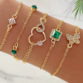 5-Piece Vintage Gold Bracelet Set: Infinity, Hearts, & Emerald Accents - Truly Yours