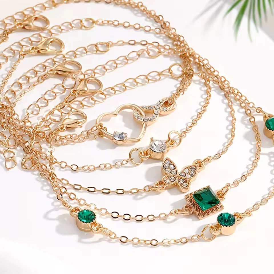 5-Piece Vintage Gold Bracelet Set: Infinity, Hearts, & Emerald Accents