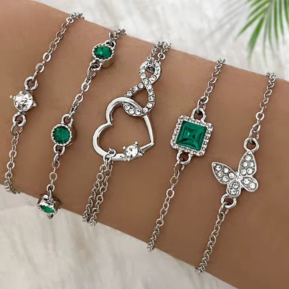 5-Piece Vintage Gold Bracelet Set: Infinity, Hearts, & Emerald Accents